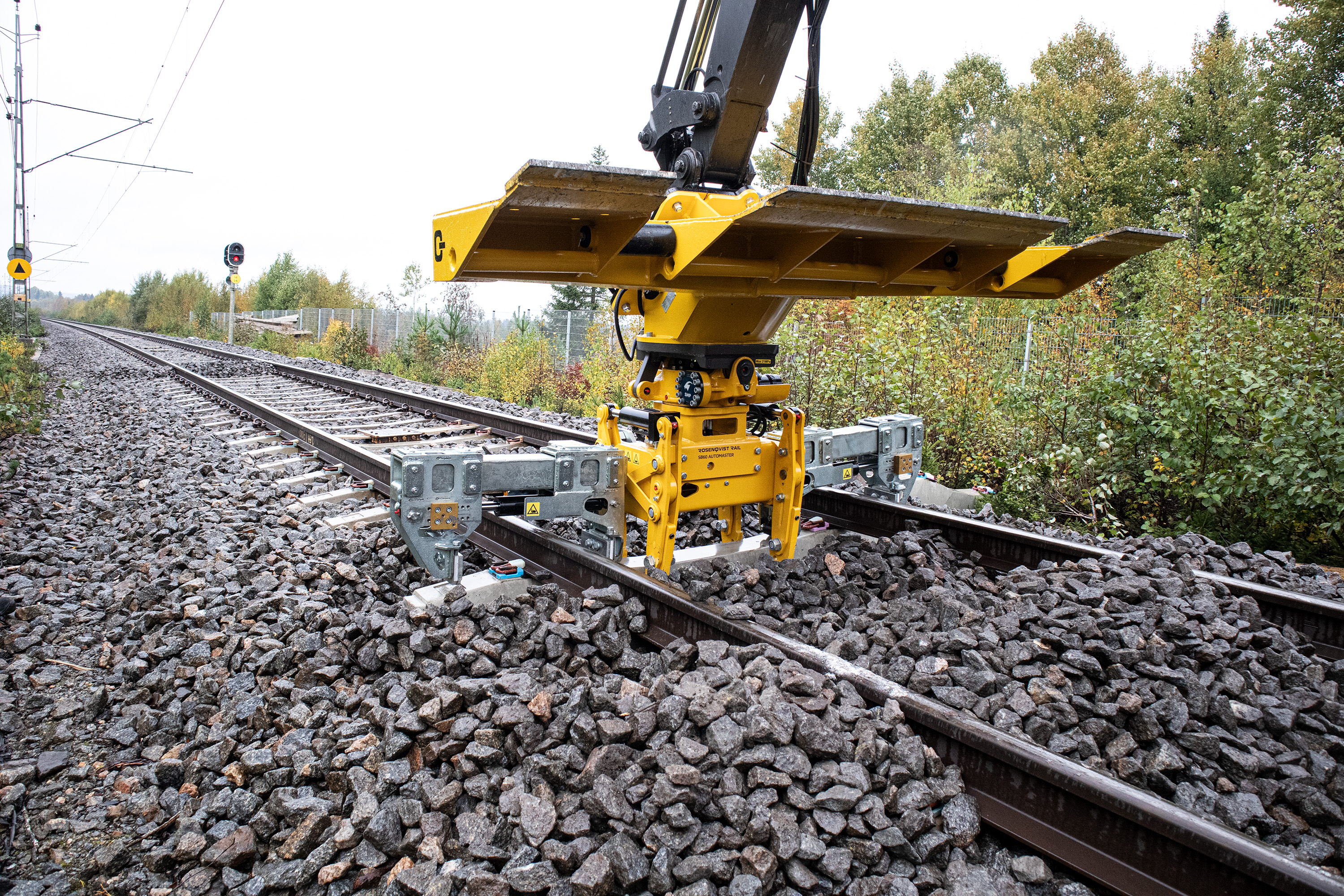 Rosenqvist Rail Slipersbytare SB60 Automaster Befästning av Fastclip
